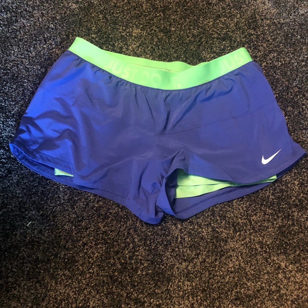 Purple Nike shorts